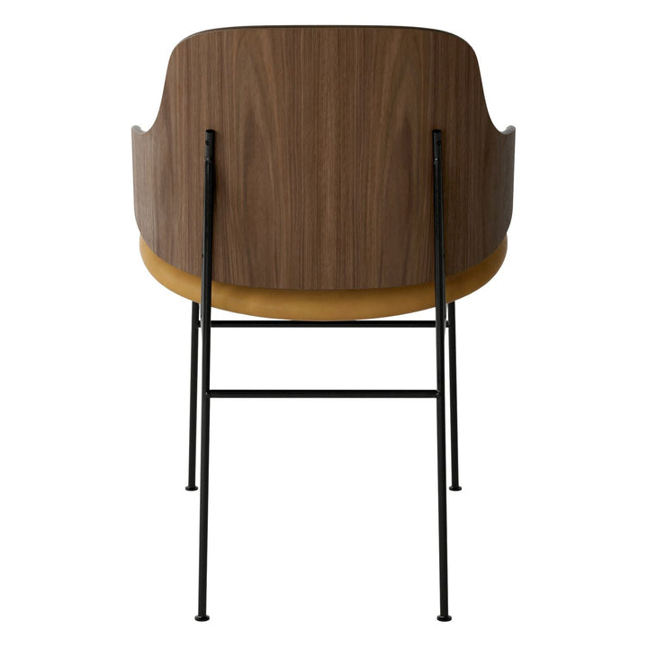 The Penguin Timber Dining Chair by Audo Copenhagen - Light, elegant, sculptural and artistic, the Penguin Dining Chair is a rare Danish Modern icon designed by Danish furniture designer Ib Kofod-Larsen in 1953. When it was launched in the United States, t