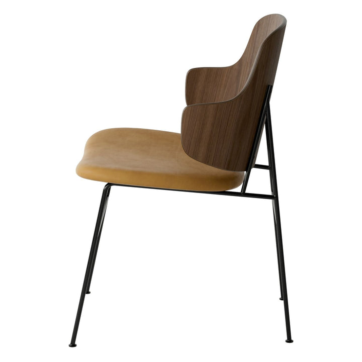 The Penguin Timber Dining Chair by Audo Copenhagen - Light, elegant, sculptural and artistic, the Penguin Dining Chair is a rare Danish Modern icon designed by Danish furniture designer Ib Kofod-Larsen in 1953. When it was launched in the United States, t