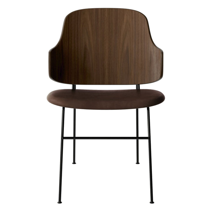 The Penguin Timber Dining Chair by Audo Copenhagen - Light, elegant, sculptural and artistic, the Penguin Dining Chair is a rare Danish Modern icon designed by Danish furniture designer Ib Kofod-Larsen in 1953. When it was launched in the United States, t