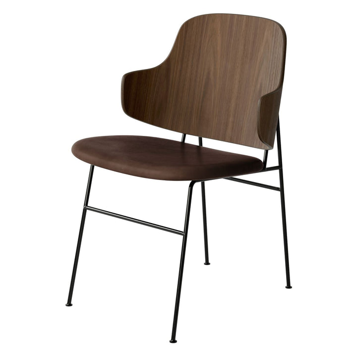 The Penguin Timber Dining Chair by Audo Copenhagen - Light, elegant, sculptural and artistic, the Penguin Dining Chair is a rare Danish Modern icon designed by Danish furniture designer Ib Kofod-Larsen in 1953. When it was launched in the United States, t