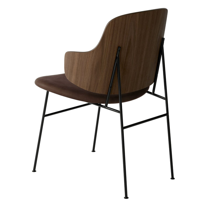 The Penguin Timber Dining Chair by Audo Copenhagen - Light, elegant, sculptural and artistic, the Penguin Dining Chair is a rare Danish Modern icon designed by Danish furniture designer Ib Kofod-Larsen in 1953. When it was launched in the United States, t