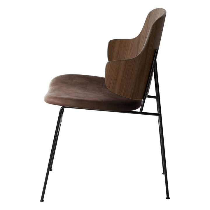 The Penguin Timber Dining Chair by Audo Copenhagen - Light, elegant, sculptural and artistic, the Penguin Dining Chair is a rare Danish Modern icon designed by Danish furniture designer Ib Kofod-Larsen in 1953. When it was launched in the United States, t