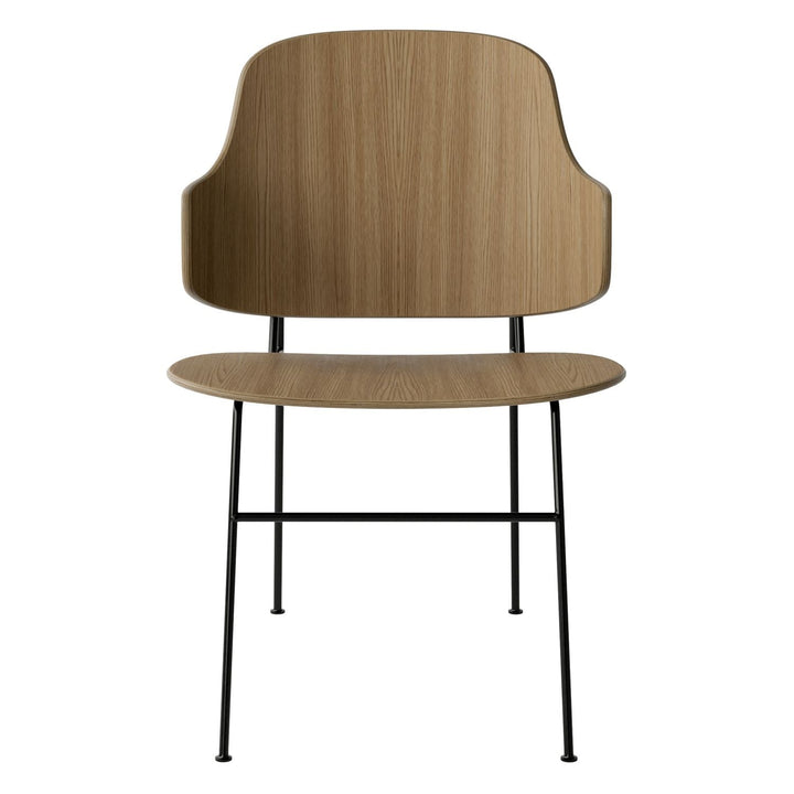 The Penguin Timber Dining Chair by Audo Copenhagen - Light, elegant, sculptural and artistic, the Penguin Dining Chair is a rare Danish Modern icon designed by Danish furniture designer Ib Kofod-Larsen in 1953. When it was launched in the United States, t