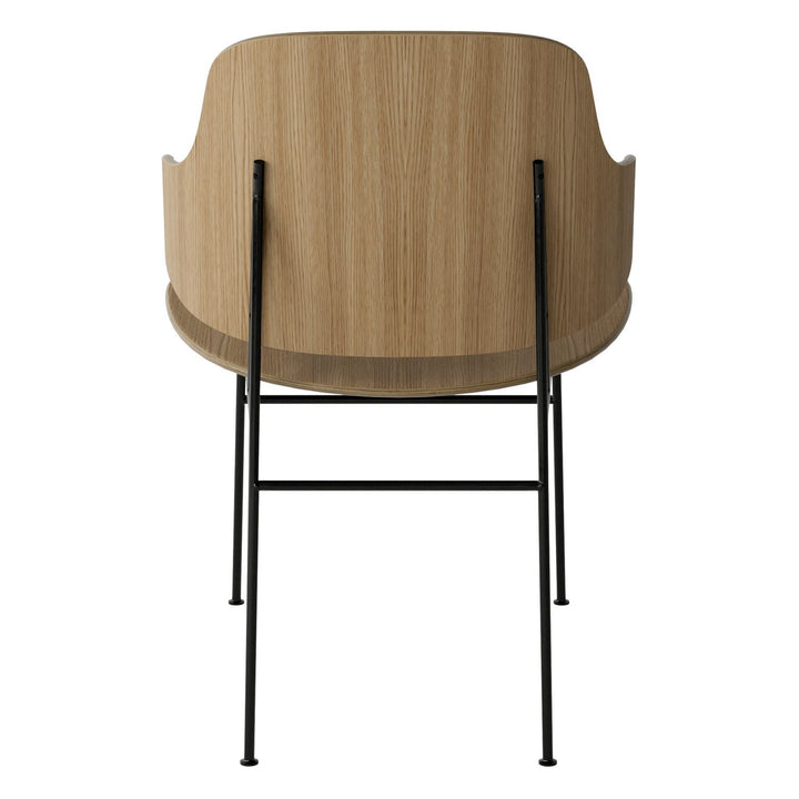 The Penguin Timber Dining Chair by Audo Copenhagen - Light, elegant, sculptural and artistic, the Penguin Dining Chair is a rare Danish Modern icon designed by Danish furniture designer Ib Kofod-Larsen in 1953. When it was launched in the United States, t