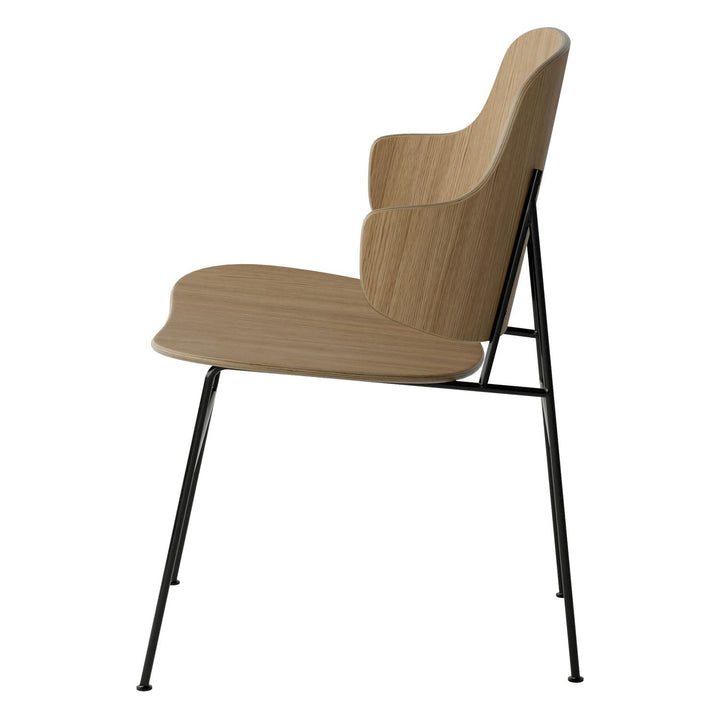 The Penguin Timber Dining Chair by Audo Copenhagen - Light, elegant, sculptural and artistic, the Penguin Dining Chair is a rare Danish Modern icon designed by Danish furniture designer Ib Kofod-Larsen in 1953. When it was launched in the United States, t