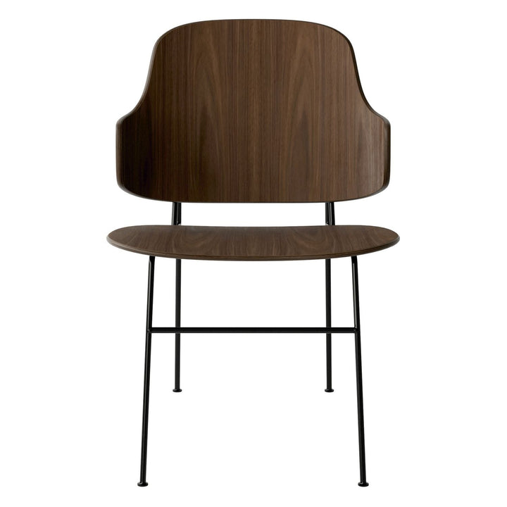 The Penguin Timber Dining Chair by Audo Copenhagen - Light, elegant, sculptural and artistic, the Penguin Dining Chair is a rare Danish Modern icon designed by Danish furniture designer Ib Kofod-Larsen in 1953. When it was launched in the United States, t