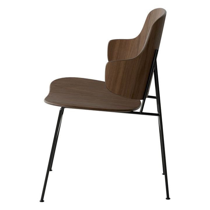 The Penguin Timber Dining Chair by Audo Copenhagen - Light, elegant, sculptural and artistic, the Penguin Dining Chair is a rare Danish Modern icon designed by Danish furniture designer Ib Kofod-Larsen in 1953. When it was launched in the United States, t
