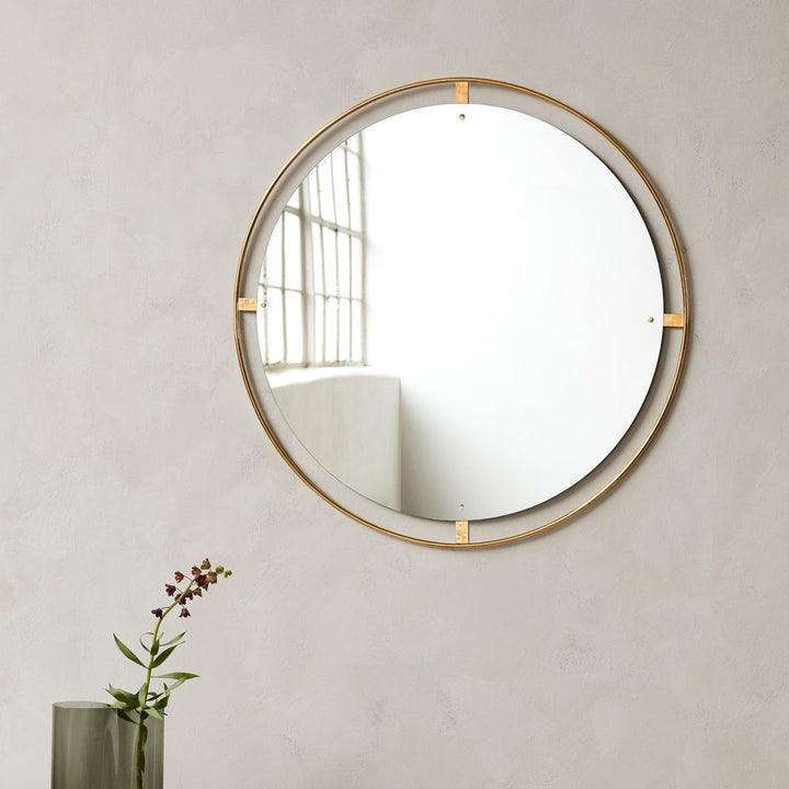 AUDO Copenhagen Nimbus Mirror 110cm, Polished Brass by Audo Copenhagen - Looking to the way in which a picture or a painting is framed, the Copenhagen-based design studio Krøyer-Sætter-Lassen investigated how an entire frame could surround a mirror withou