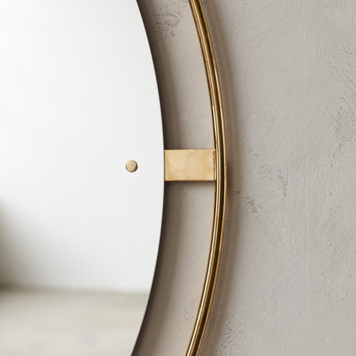 AUDO Copenhagen Nimbus Mirror 110cm, Polished Brass by Audo Copenhagen - Looking to the way in which a picture or a painting is framed, the Copenhagen-based design studio Krøyer-Sætter-Lassen investigated how an entire frame could surround a mirror withou