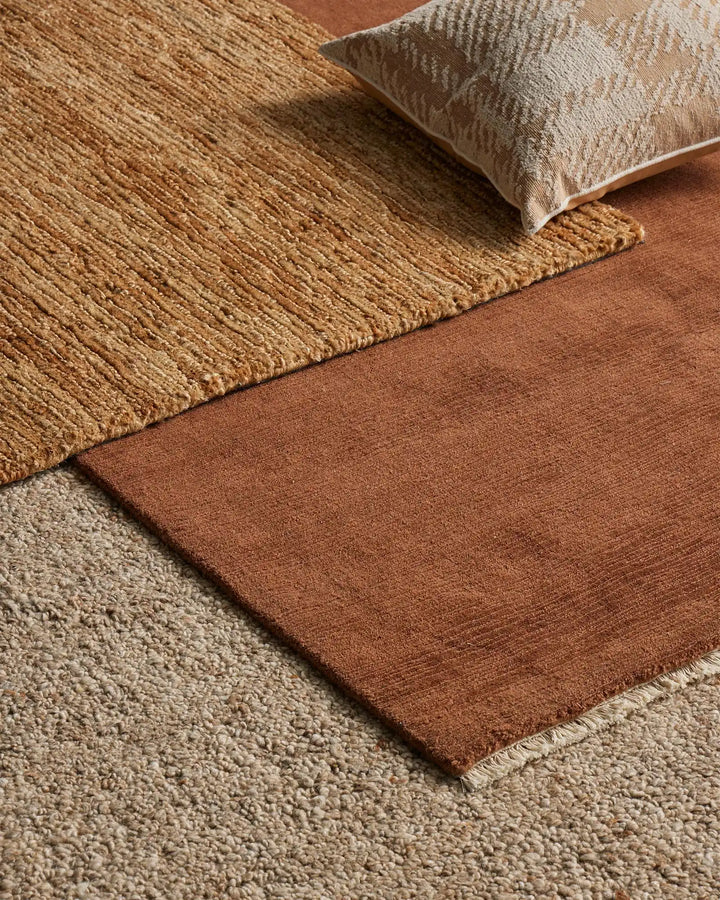 Bastian Natural - Handcrafted Jute Rug Bastian Natural offers a unique, durable jute rug combining artistry and craftsmanship for a rich tactile experience in your space.