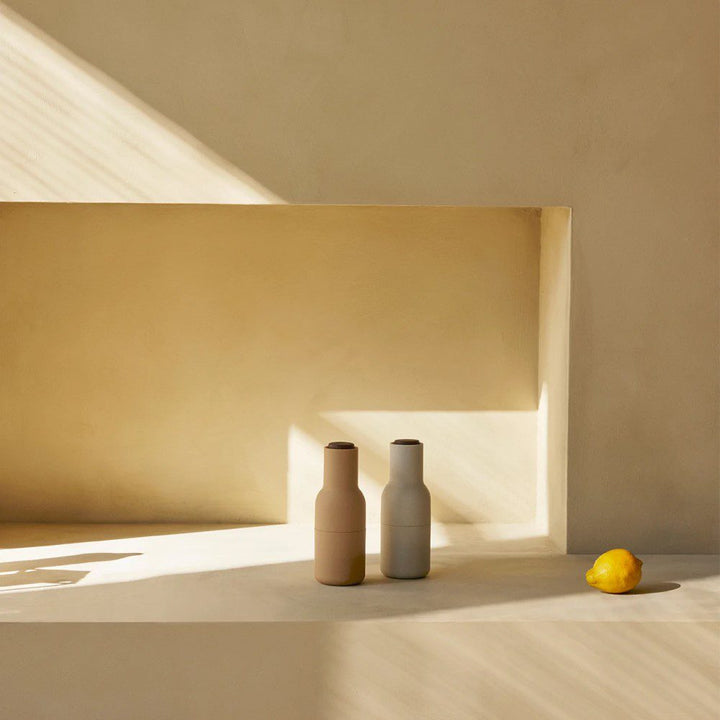 AUDO CPH (ex MENU) Salt and Pepper Bottle Grinder Set, Barley w/ Walnut Lid by Audo Copenhagen - MENU Bottle Grinders have a rounded base that fits perfectly into your hand and a tactile rubber surface that is easy to grip and clean. The grinders have a p