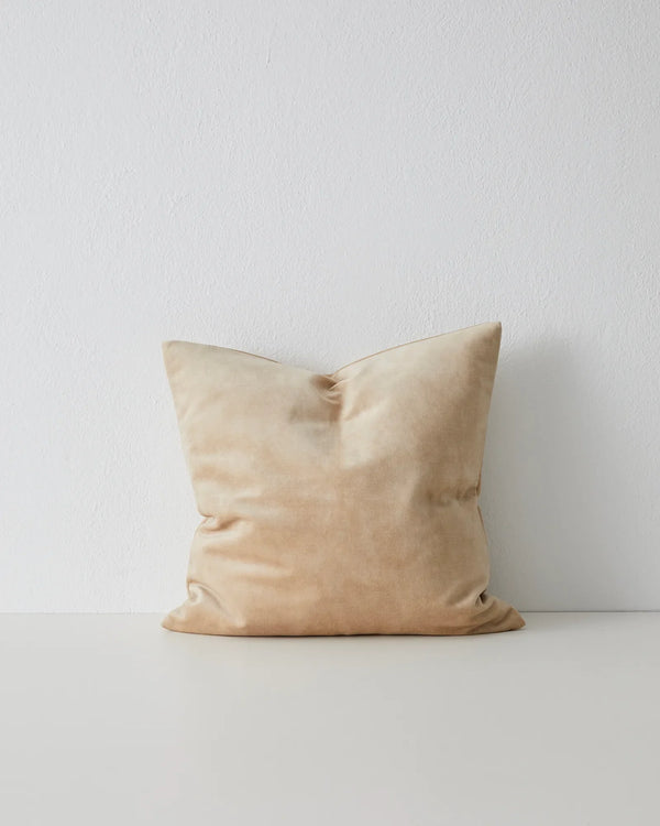 Ava Nougat Cushion - Luxurious Velvet Comfort Discover the Ava Nougat cushion in creamy beige, a luxurious addition to your space with over 20 colorways and a soft velvet-like texture.
