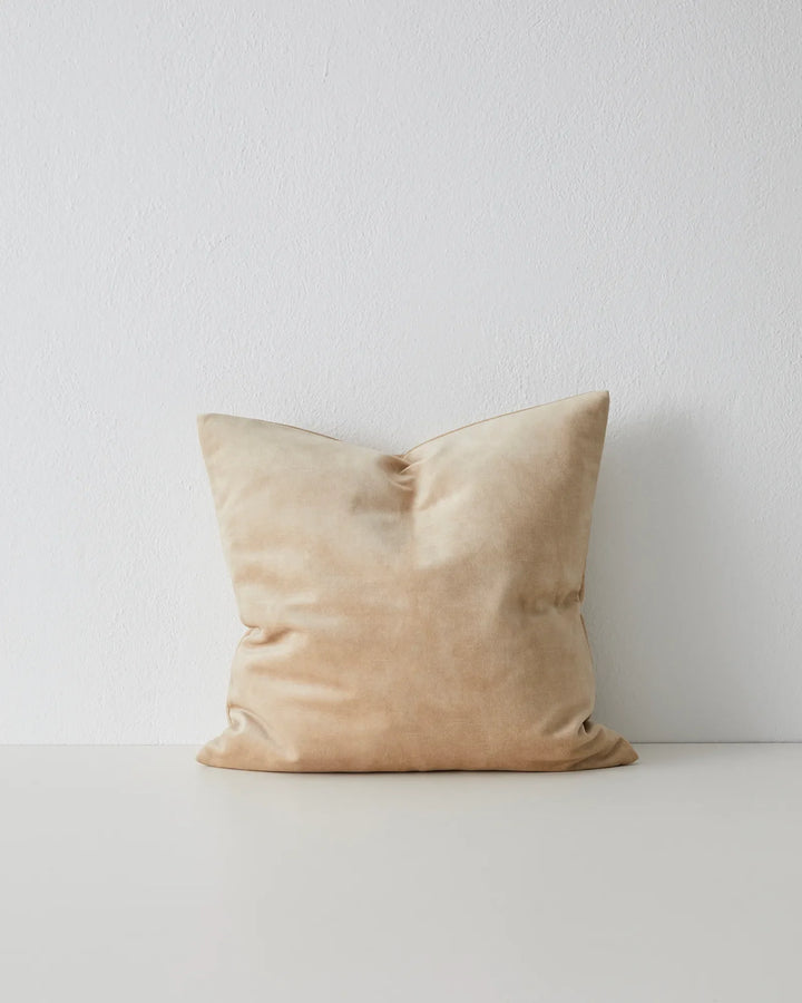 Ava Nougat Cushion - Luxurious Velvet Comfort Discover the Ava Nougat cushion in creamy beige, a luxurious addition to your space with over 20 colorways and a soft velvet-like texture.