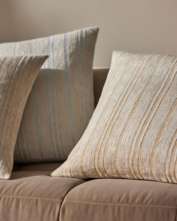 Adriana Glacier A woven mix of lustrous chenille and dry natural fibres gives Adriana a chic finish and luxe feel. A palette that heros modern, essential, on-trend hues. Glacier combines sky blue with a contrasting sandstone stripe.Timeless and classic in