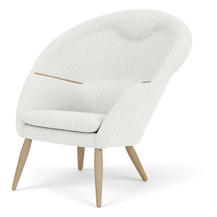Oda Lounge Chair by Audo Copenhagen - Originally dubbed Model 9, the Oda Chair was an ambitious design from the very beginning. Created by Arnold Madsen in around 1956, the aesthetic reinterpretation of an armchair has a complex horseshoe construction wit