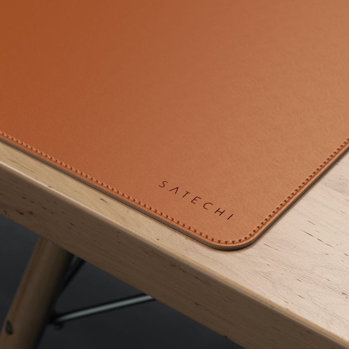 Satechi Eco Leather Deskmate Protect your desk space in style with the Satechi Eco-Leather Deskmate. Crafted from quality Polyurethane (PU) leather, the Desk Mat can be used as a mouse pad, writing surface, food mat and more, while complementing a variety