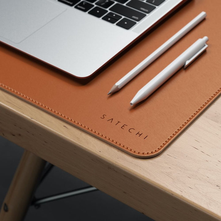 Satechi Eco Leather Deskmate Protect your desk space in style with the Satechi Eco-Leather Deskmate. Crafted from quality Polyurethane (PU) leather, the Desk Mat can be used as a mouse pad, writing surface, food mat and more, while complementing a variety