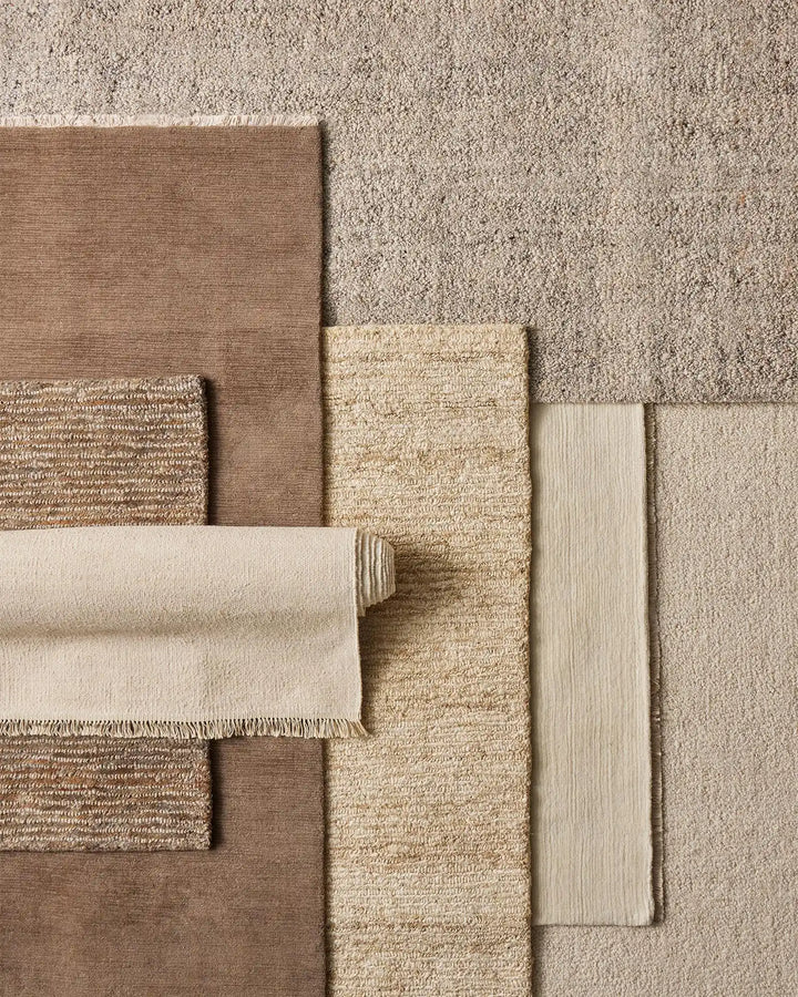 Bastian Fossil - Natural Jute Rug Discover the Bastian Fossil rug, a handcrafted jute masterpiece offering durability and unique texture for your home.