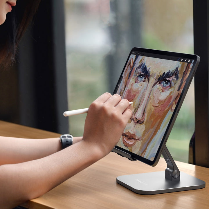 Satechi Aluminum Desktop Stand for iPad Pro (Space Grey) Elevate your iPad to a multi-purpose station with the Satechi Aluminium Desktop Stand for iPad. Equipped with adjustable mount and base hinges with a foldable design, the Desktop Stand easily create