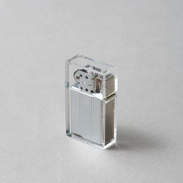 Handcrafted Tsubota Pearl Hard Edge Clear petrol lighter, made in Japan, featuring a sleek clear design.