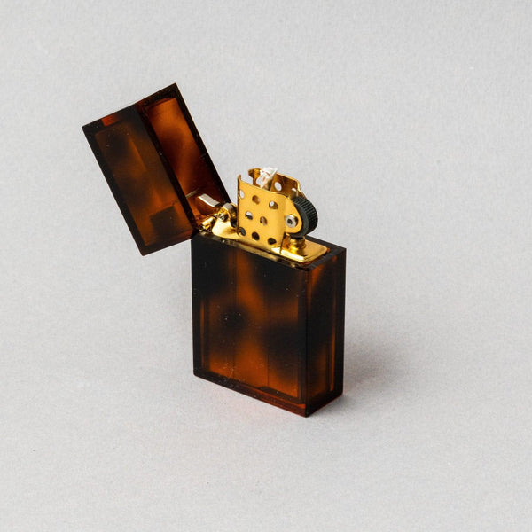 TSUBOTA PEARL Hard Edge Marble Tortoise petrol lighter with open lid, handcrafted in Tokyo, Japan.