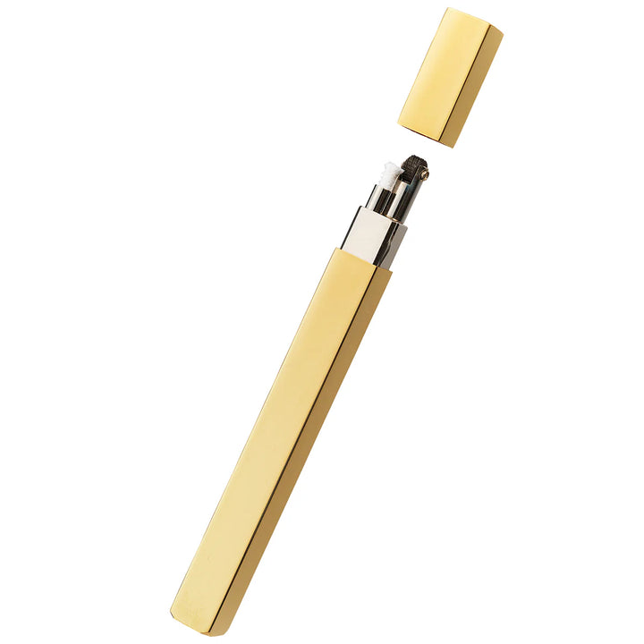 Gold metal petrol lighter by Tsubota Pearl, elegantly slender and refillable, handcrafted in Tokyo.