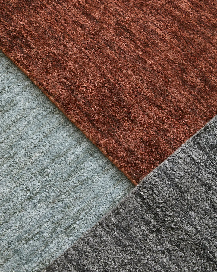Almonte Clay - Luxurious Hand-Woven Rug Almonte Clay rug offers thickness and softness, ideal for low-traffic areas and crafted from bamboo silk and wool.