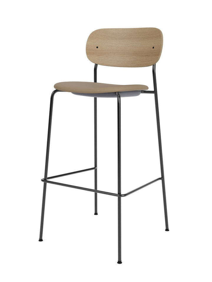 Co Bar Chair, Seat Upholstered by Audo Copenhagen - The Co Chair Collection is defined by its contoured form and warm materials. Conceived in collaboration with Norm Architects and Els Van Hoorebeeck, the Co Bar/Counter Chair is shaped with a wide back an
