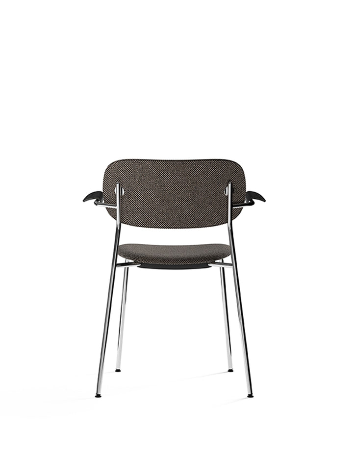 Co Dining Chair, fully upholstered with armrest, Chrome by Audo Copenhagen - The Co Chair Collection pairs a lightweight, sleek profile with great seating comfort. Available with or without armrests in three wood versions, the versatile design of the full