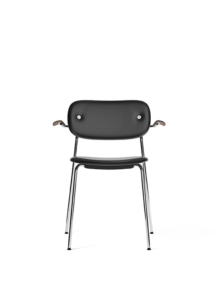 Co Dining Chair, fully upholstered with armrest, Chrome by Audo Copenhagen - The Co Chair Collection pairs a lightweight, sleek profile with great seating comfort. Available with or without armrests in three wood versions, the versatile design of the full