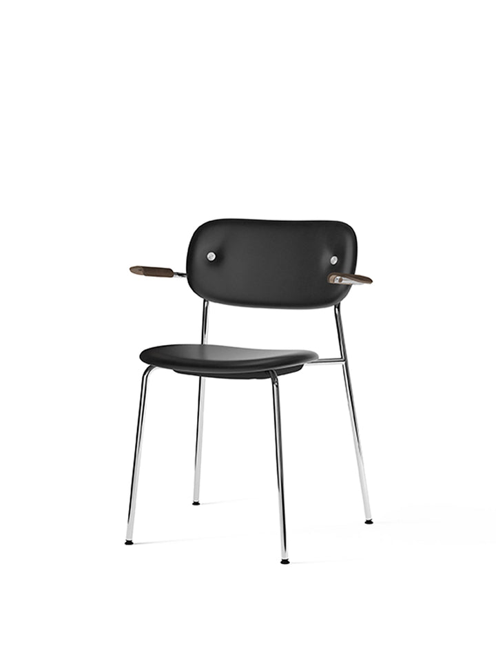 Co Dining Chair, fully upholstered with armrest, Chrome by Audo Copenhagen - The Co Chair Collection pairs a lightweight, sleek profile with great seating comfort. Available with or without armrests in three wood versions, the versatile design of the full