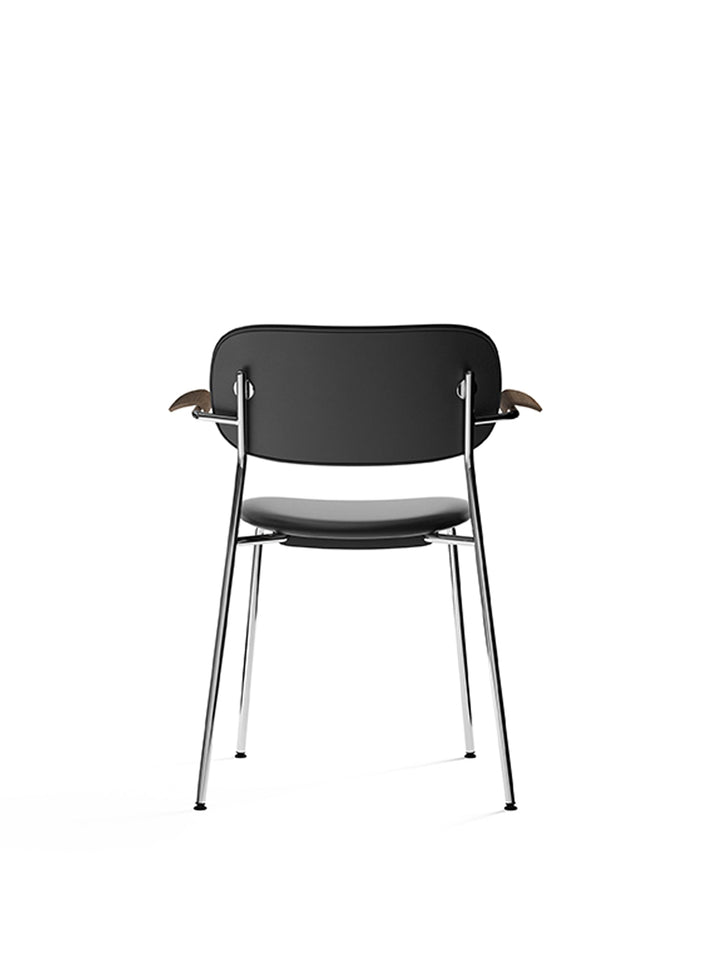 Co Dining Chair, fully upholstered with armrest, Chrome by Audo Copenhagen - The Co Chair Collection pairs a lightweight, sleek profile with great seating comfort. Available with or without armrests in three wood versions, the versatile design of the full