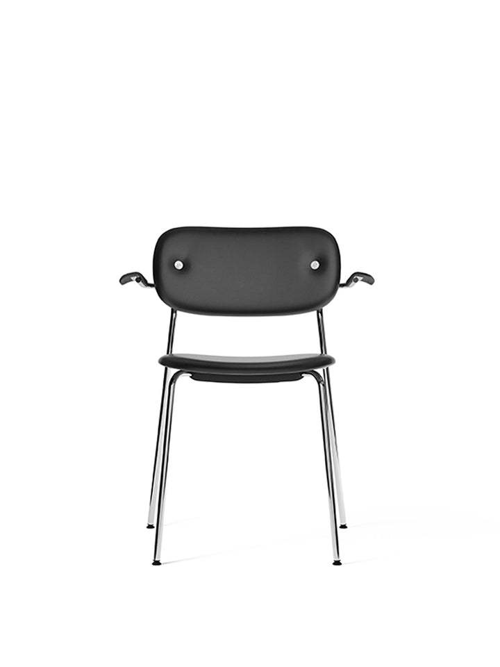 Co Dining Chair, fully upholstered with armrest, Chrome by Audo Copenhagen - The Co Chair Collection pairs a lightweight, sleek profile with great seating comfort. Available with or without armrests in three wood versions, the versatile design of the full