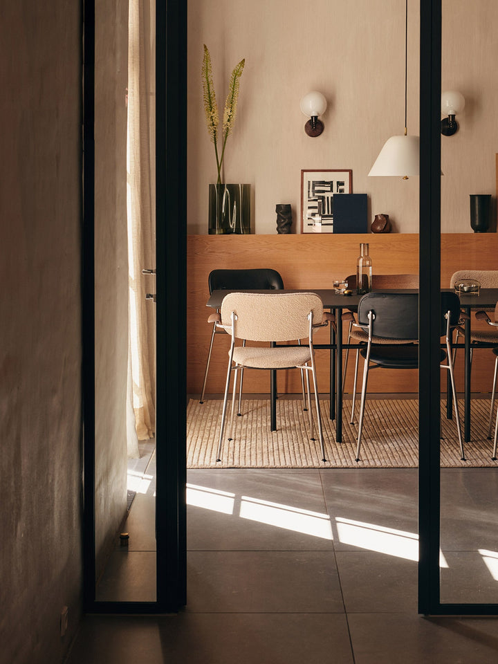 Co Dining Chair, fully upholstered with armrest, Chrome by Audo Copenhagen - The Co Chair Collection pairs a lightweight, sleek profile with great seating comfort. Available with or without armrests in three wood versions, the versatile design of the full