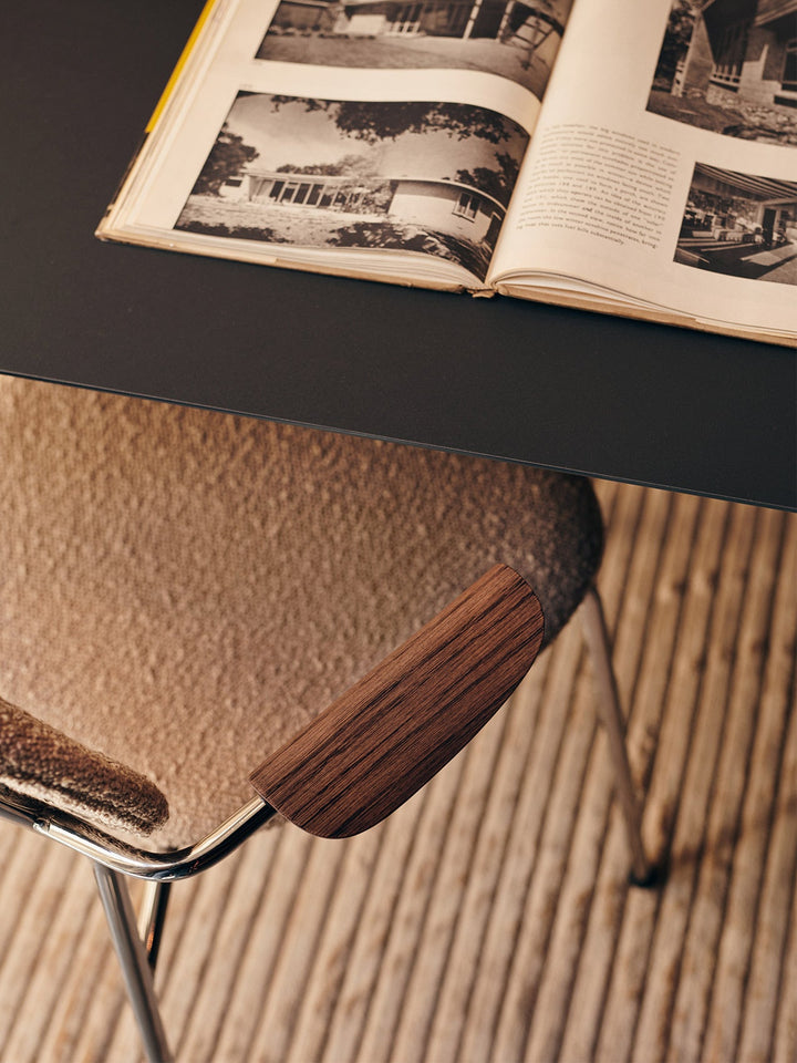 Co Dining Chair, fully upholstered with armrest, Chrome by Audo Copenhagen - The Co Chair Collection pairs a lightweight, sleek profile with great seating comfort. Available with or without armrests in three wood versions, the versatile design of the full