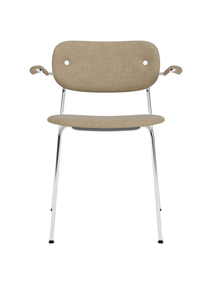 Co Dining Chair, fully upholstered with armrest, Chrome by Audo Copenhagen - The Co Chair Collection pairs a lightweight, sleek profile with great seating comfort. Available with or without armrests in three wood versions, the versatile design of the full