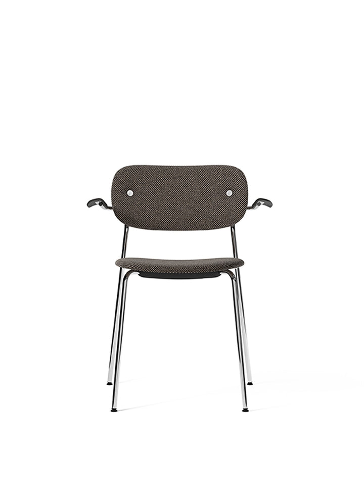 Co Dining Chair, fully upholstered with armrest, Chrome by Audo Copenhagen - The Co Chair Collection pairs a lightweight, sleek profile with great seating comfort. Available with or without armrests in three wood versions, the versatile design of the full