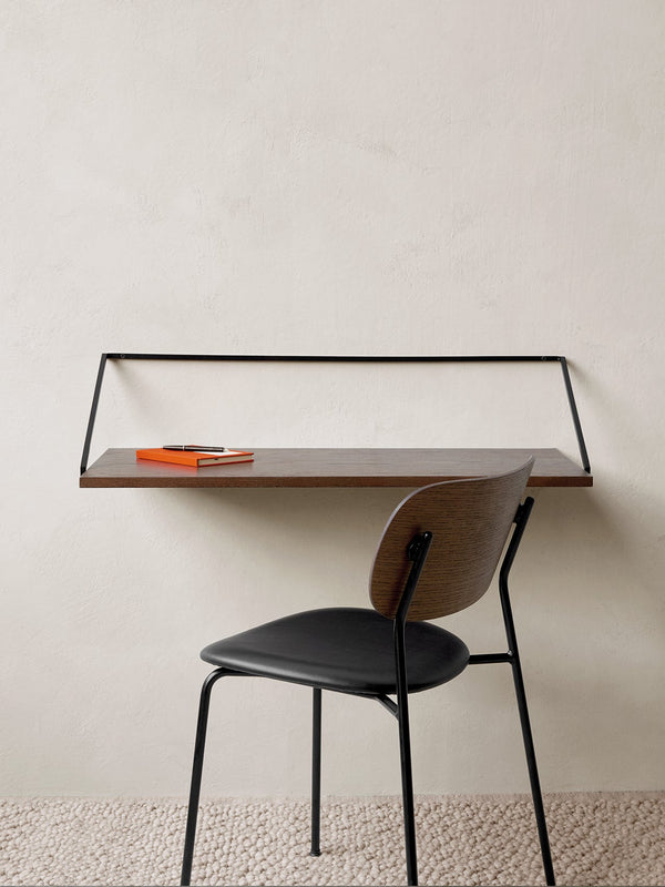 Co Dining Chair, upholstered seat, Black Frame by Audo Copenhagen - The Co Chair by The Office Group combines a lightweight profile and excellent seating comfort. It can stack up to 10 chairs compactly. With its contoured form and warm materials, this des