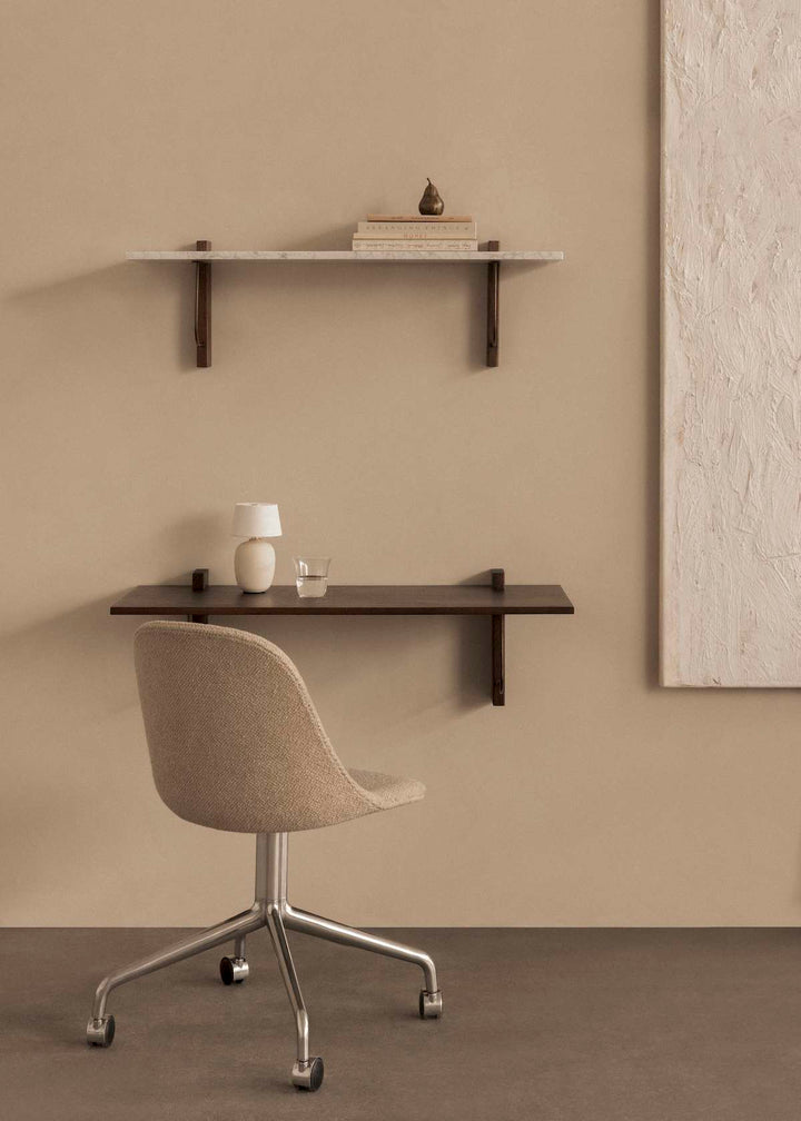 Audo Corbel Desk Shelf by Audo Copenhagen - The Corbel Wall Desk is a versatile and stylish solution for remote work and compact home settings. Inspired by weight-bearing architectural brackets, this desk features solid wood edges and a smooth linoleum su