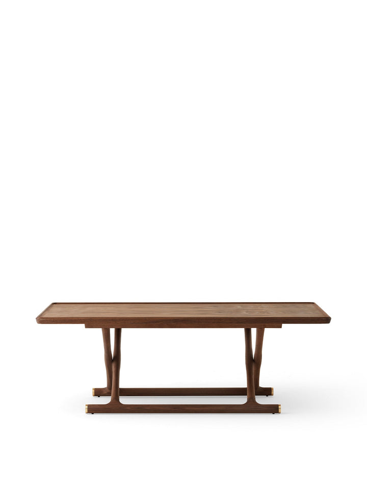 Audo Jäger Lounge Table by Audo Copenhagen - The Jäger Lounge Table by Mogens Lassen, an archival design from 1941, combines traditional craftsmanship with functional design. Made with oiled oak or walnut wood and brass details, this foldable table is ins