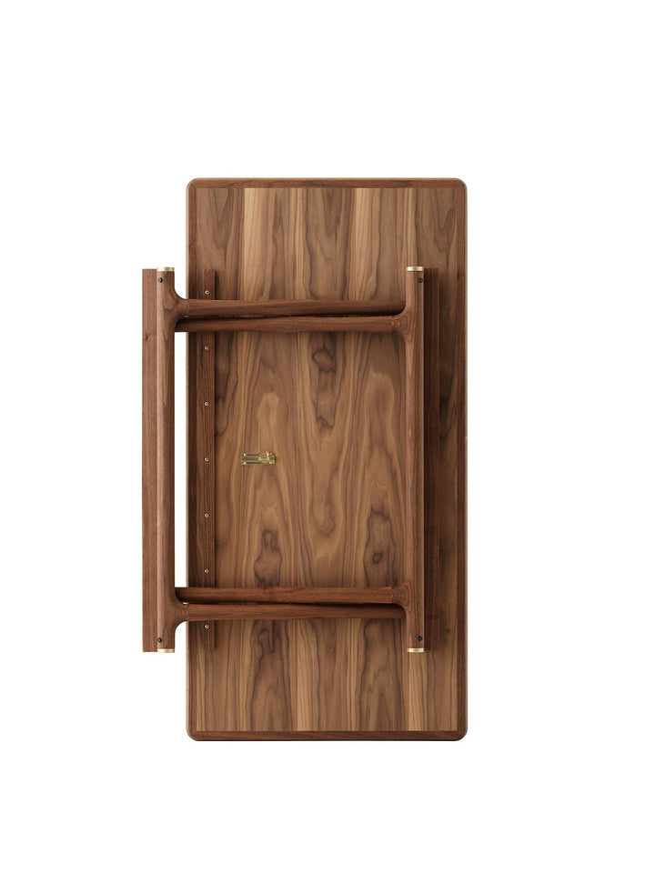 Audo Jäger Lounge Table by Audo Copenhagen - The Jäger Lounge Table by Mogens Lassen, an archival design from 1941, combines traditional craftsmanship with functional design. Made with oiled oak or walnut wood and brass details, this foldable table is ins