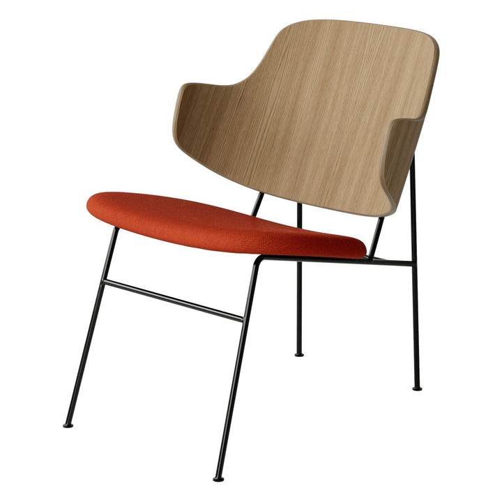 The Penguin Timber Lounge Chair by Audo Copenhagen - The Penguin Lounge Chair is a mid-century masterpiece. Reclining and harmonious, but with plenty of boldness, it is characterised by calmness and balance. Sitting in this deep, low chair feels comfortab