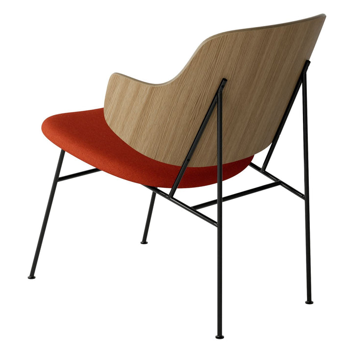 The Penguin Timber Lounge Chair by Audo Copenhagen - The Penguin Lounge Chair is a mid-century masterpiece. Reclining and harmonious, but with plenty of boldness, it is characterised by calmness and balance. Sitting in this deep, low chair feels comfortab