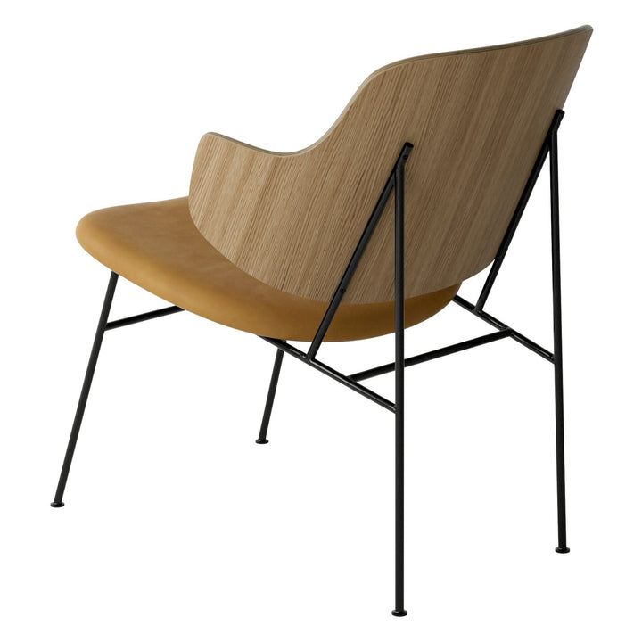 The Penguin Timber Lounge Chair by Audo Copenhagen - The Penguin Lounge Chair is a mid-century masterpiece. Reclining and harmonious, but with plenty of boldness, it is characterised by calmness and balance. Sitting in this deep, low chair feels comfortab