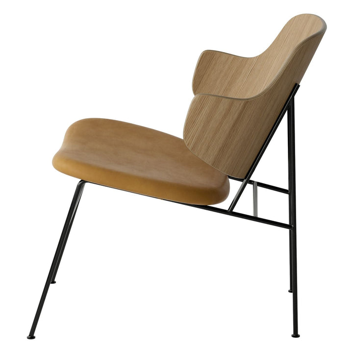 The Penguin Timber Lounge Chair by Audo Copenhagen - The Penguin Lounge Chair is a mid-century masterpiece. Reclining and harmonious, but with plenty of boldness, it is characterised by calmness and balance. Sitting in this deep, low chair feels comfortab