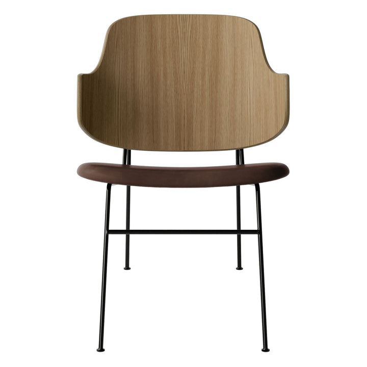 The Penguin Timber Lounge Chair by Audo Copenhagen - The Penguin Lounge Chair is a mid-century masterpiece. Reclining and harmonious, but with plenty of boldness, it is characterised by calmness and balance. Sitting in this deep, low chair feels comfortab