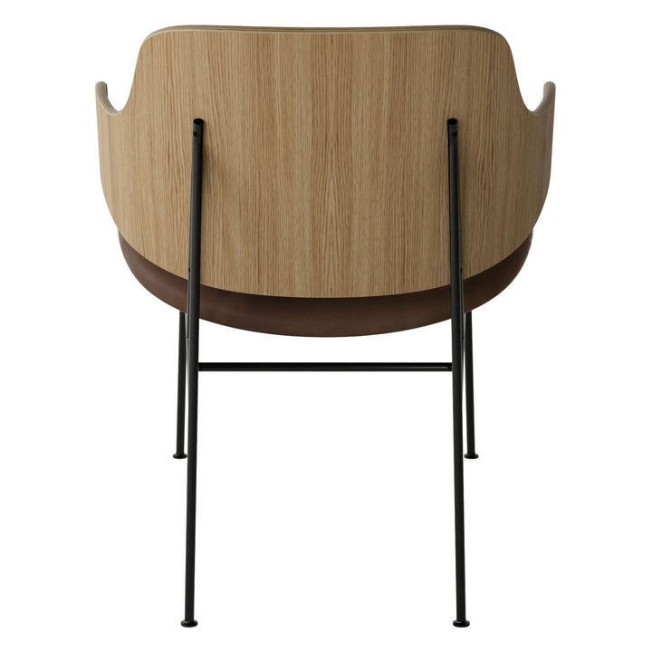 The Penguin Timber Lounge Chair by Audo Copenhagen - The Penguin Lounge Chair is a mid-century masterpiece. Reclining and harmonious, but with plenty of boldness, it is characterised by calmness and balance. Sitting in this deep, low chair feels comfortab