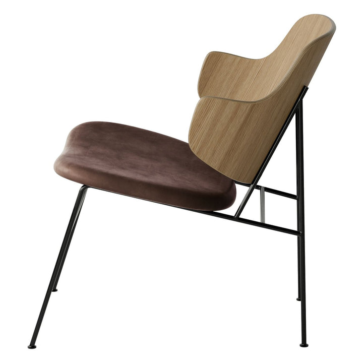 The Penguin Timber Lounge Chair by Audo Copenhagen - The Penguin Lounge Chair is a mid-century masterpiece. Reclining and harmonious, but with plenty of boldness, it is characterised by calmness and balance. Sitting in this deep, low chair feels comfortab