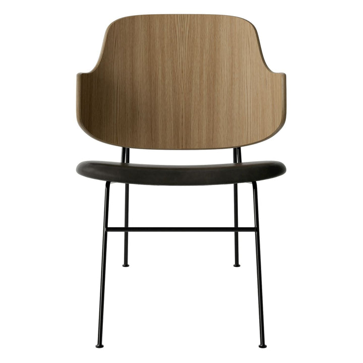 The Penguin Timber Lounge Chair by Audo Copenhagen - The Penguin Lounge Chair is a mid-century masterpiece. Reclining and harmonious, but with plenty of boldness, it is characterised by calmness and balance. Sitting in this deep, low chair feels comfortab