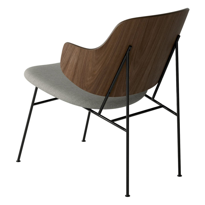 The Penguin Timber Lounge Chair by Audo Copenhagen - The Penguin Lounge Chair is a mid-century masterpiece. Reclining and harmonious, but with plenty of boldness, it is characterised by calmness and balance. Sitting in this deep, low chair feels comfortab